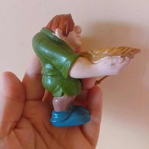 Disney figure Quasimodo holding a nest used