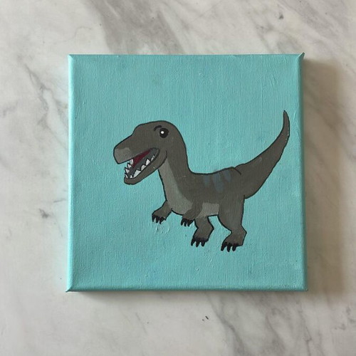 Painting new canvas art with dinosaur motif