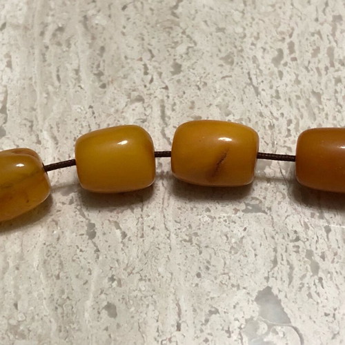 Worry beads used from royal amber with silver logo
