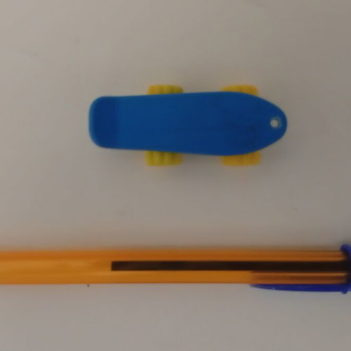 Vintage Algida Lucky Cup blue skateboard toy from the 1980s