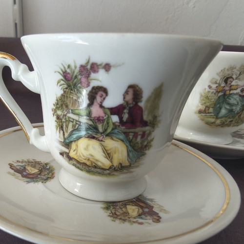 Vintage porcelain coffee cup set of 3 with romantic scenes and gold detail