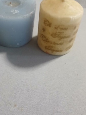 Set of 2 decorative candles with minor dents