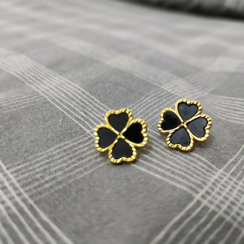 Gold earrings with black classic design, like new, steel