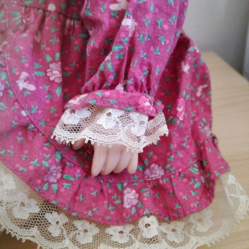 Porcelain doll used, 38cm tall with clothes and shoes