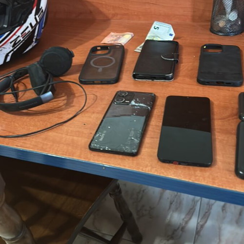 iPhone 14 Pro Max cases and accessories, 3 phones, 2 working, headphones