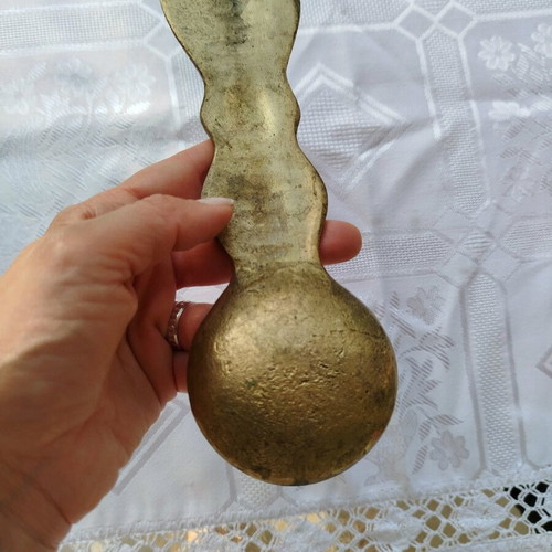 Brass decorative item like new with intricate carvings 24 cm long