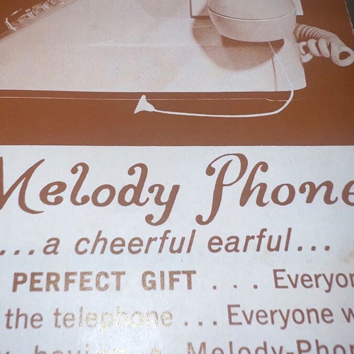 Antique telephone like new with music and 1960s inserts