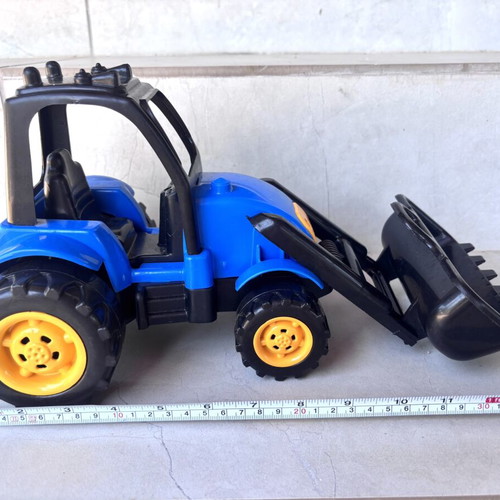 Plastic bulldozer toy used, blue and yellow