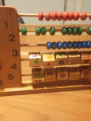 Wooden educational toy learning numbers, math, and time like new