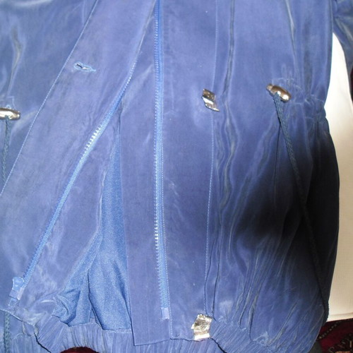 Silk blue jacket like new, long with silver buttons