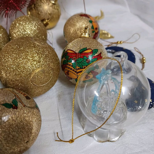 Christmas decorations like new, assorted ornaments and ribbon