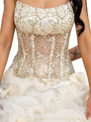 Ivory wedding dress with corset and gold details