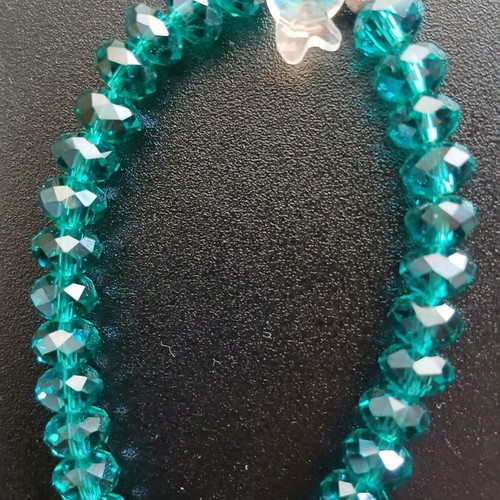 Bracelet with crystal beads used, emerald/petrol color with fish motif
