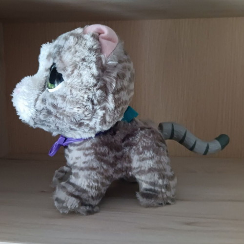 Plush feline doll used with sound