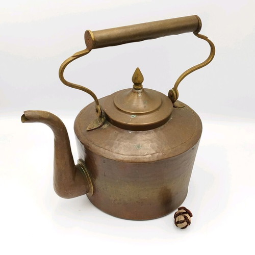 Vintage copper hand-forged teapot used with brass elements