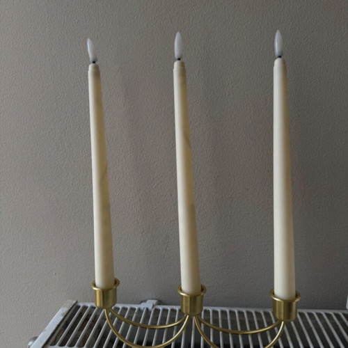 Gold candlestick holder without candles