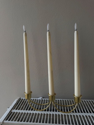 Gold candlestick holder without candles