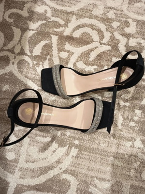 Franchesca Moretti women's black sandals with silver details