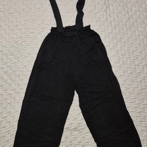 Black fabric pants with suspenders used, one size