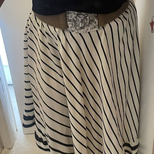 Striped black and white midi skirt with elastic waist and ruffle