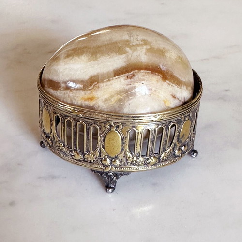 Vintage decorative egg from natural onyx stone in carved silver-plated base used