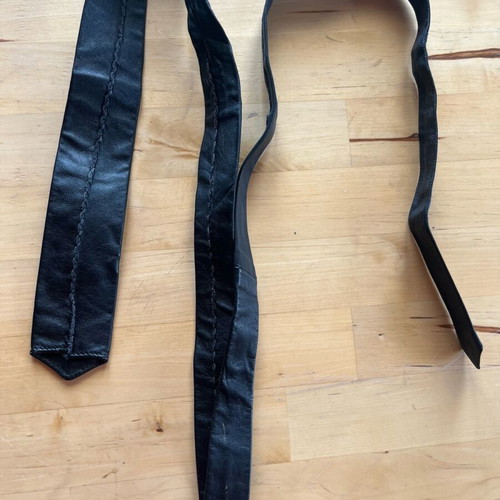 Leather black tie used with gray detail