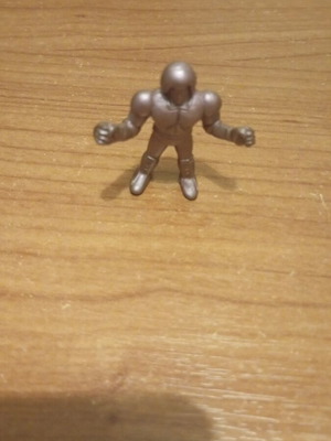 Purple alien figure used