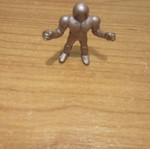 Purple alien figure used