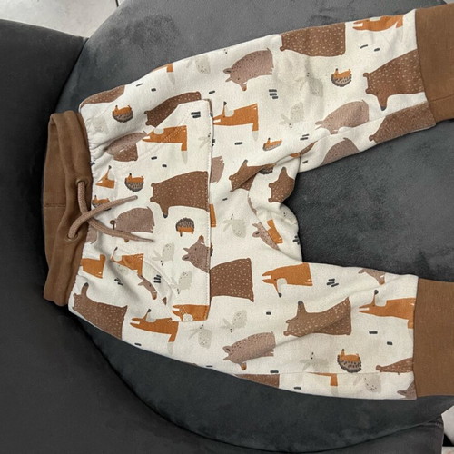 Baby pants 9 months like new, unisex with animals