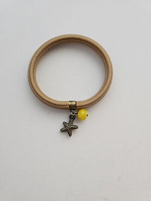 Velvet bracelet with starfish and yellow bead used, beige
