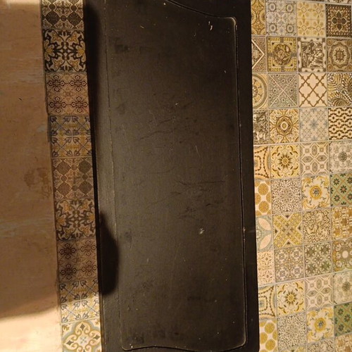Wooden surface with metal handles used, decorative base for candles