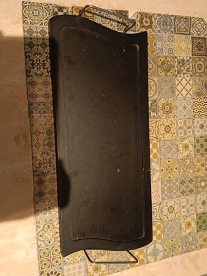 Wooden surface with metal handles used, decorative base for candles