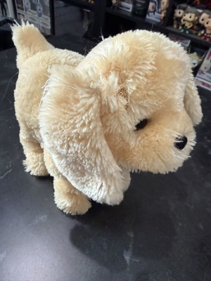 Beige plush dog toy