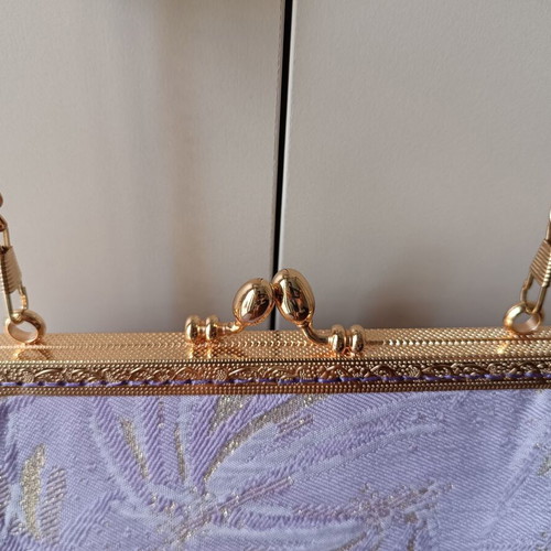 Vintage shoulder bag new in purple and gold shades with floral lining