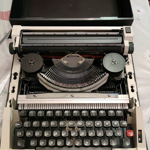 Olympia antique typewriter used with cover and keys