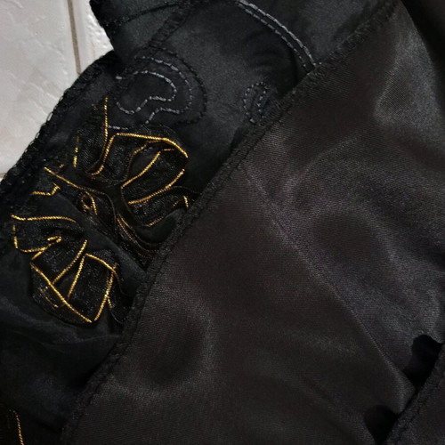 Satin mini skirt black like new with layered ruffles and gold details
