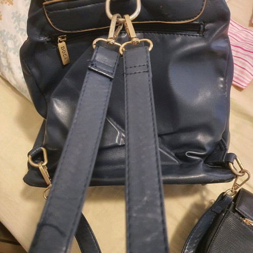 Doca backpack used, blue and gold with multiple compartments
