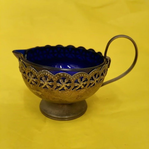 Vintage cobalt blue glass creamer with metal holder, like new