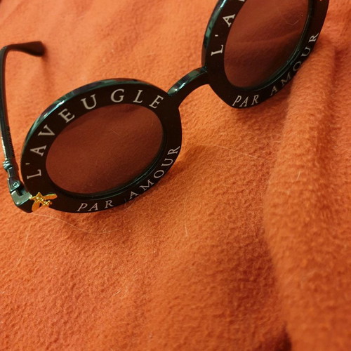 Round modern sunglasses new, black with gold detail