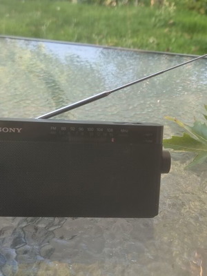 Sony ICF-306 portable analog radio used