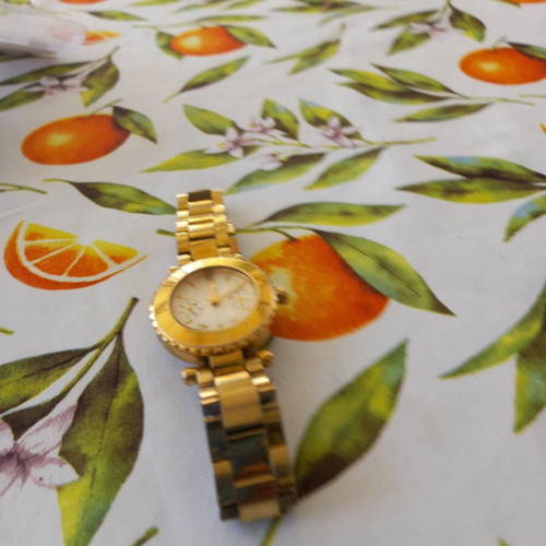 Guess women's watch, gold tone