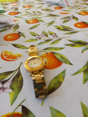Guess women's watch, gold tone