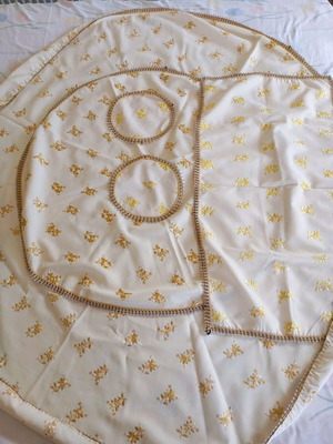 Table linens used, round tablecloth and rectangular runner