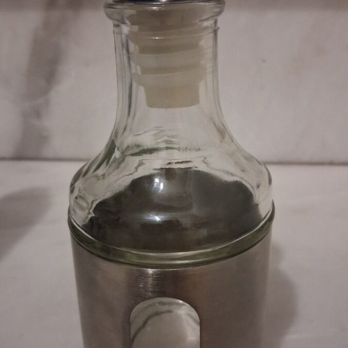 Glass oil container with stainless steel casing, new, ITEM International