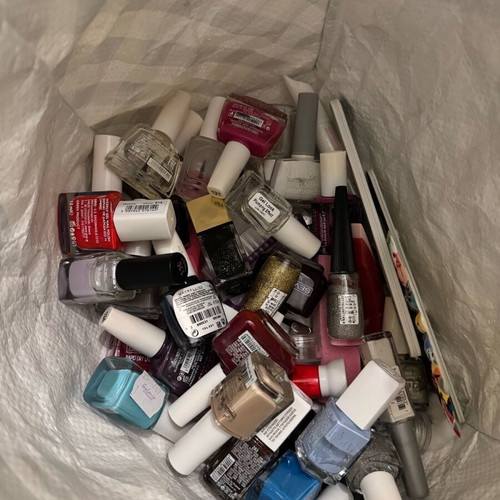 Various nail polishes and nail tools like new