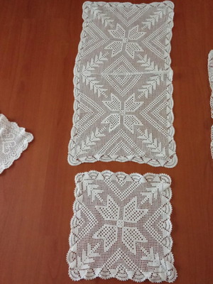 Handmade white table runner and napkin used