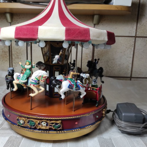 Mr Christmas carousel used with music and lights