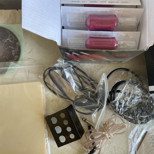 Dragonhawk Tattoo Coil Set used with extra practice materials