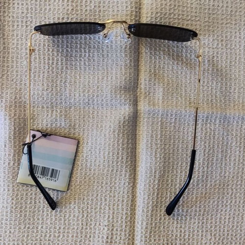 Solo-Solis NDL2906 sunglasses new with gold finish and gray lenses