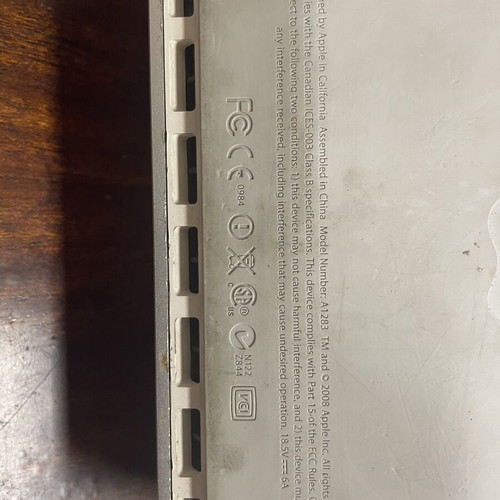 Mac mini 2009 with charger and monitor adapter